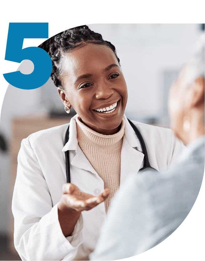 Happy doctor chatting with patient