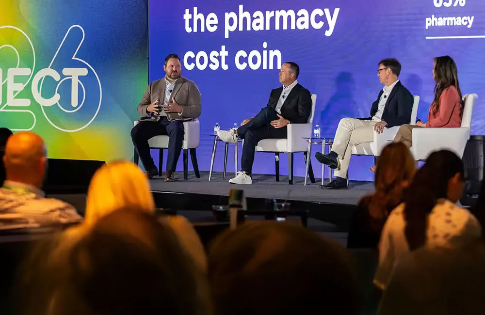 Pharmacy panel discussing on stage