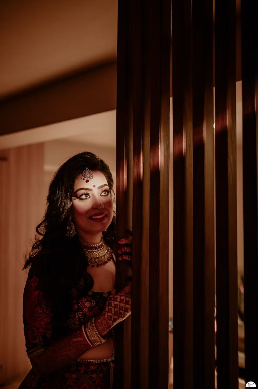 Bride peeking from inside pic captured