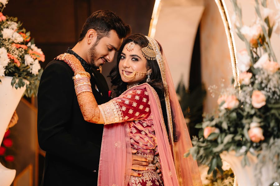 Happy couples romancing in their wedding ceremony shot
