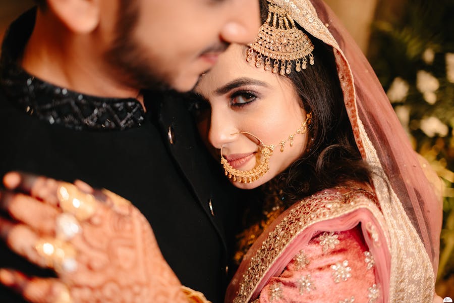 Dewy makeup on pretty bride's face highlighted