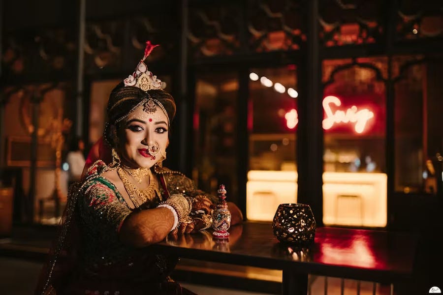 Bride wearing statement jewel pieces on wedding