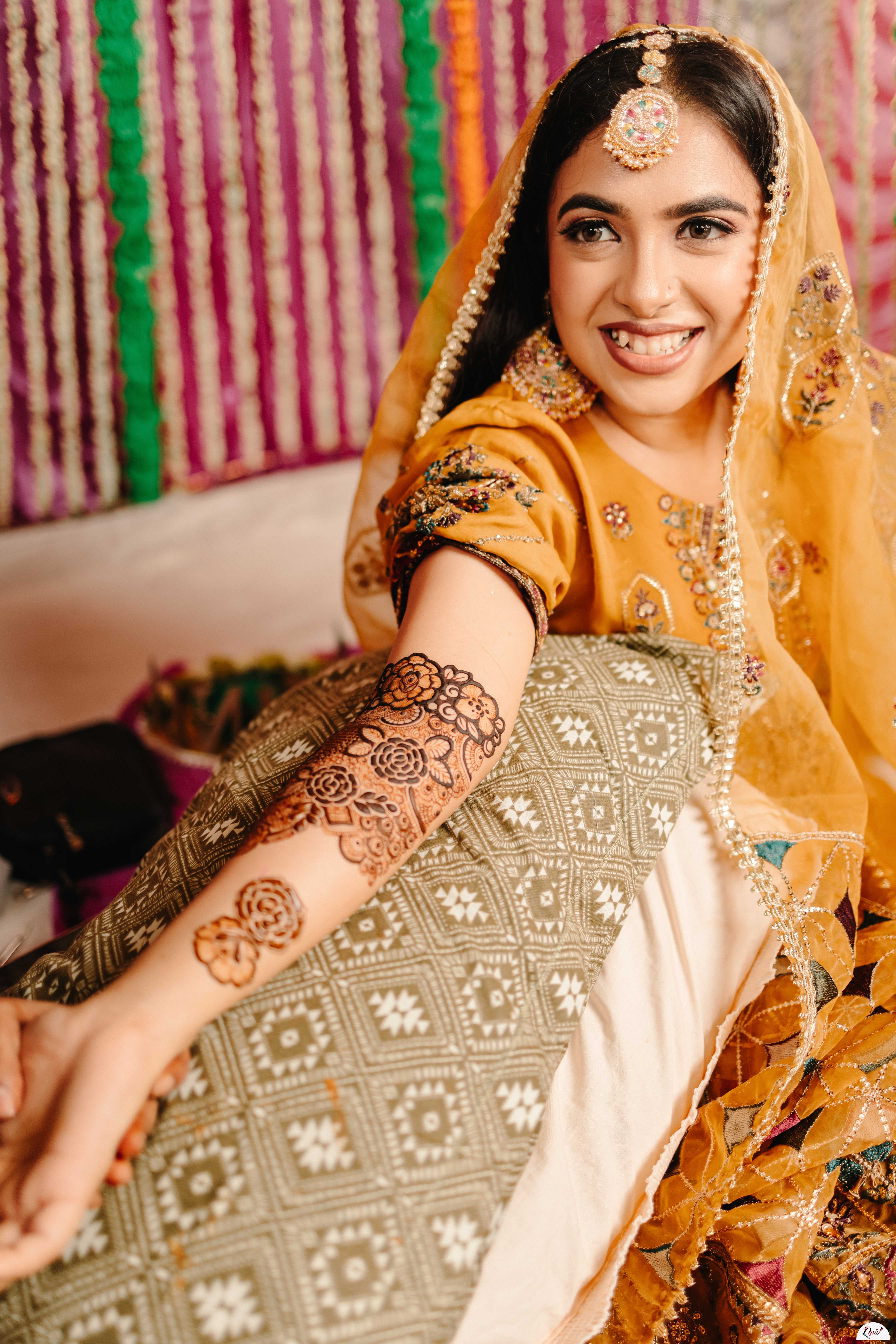 Pic of detailed mehndi on bride's hand