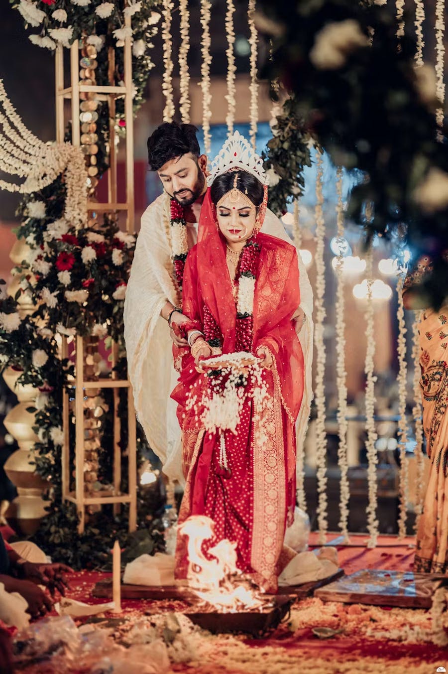 Pic of couple performing wedding rituals