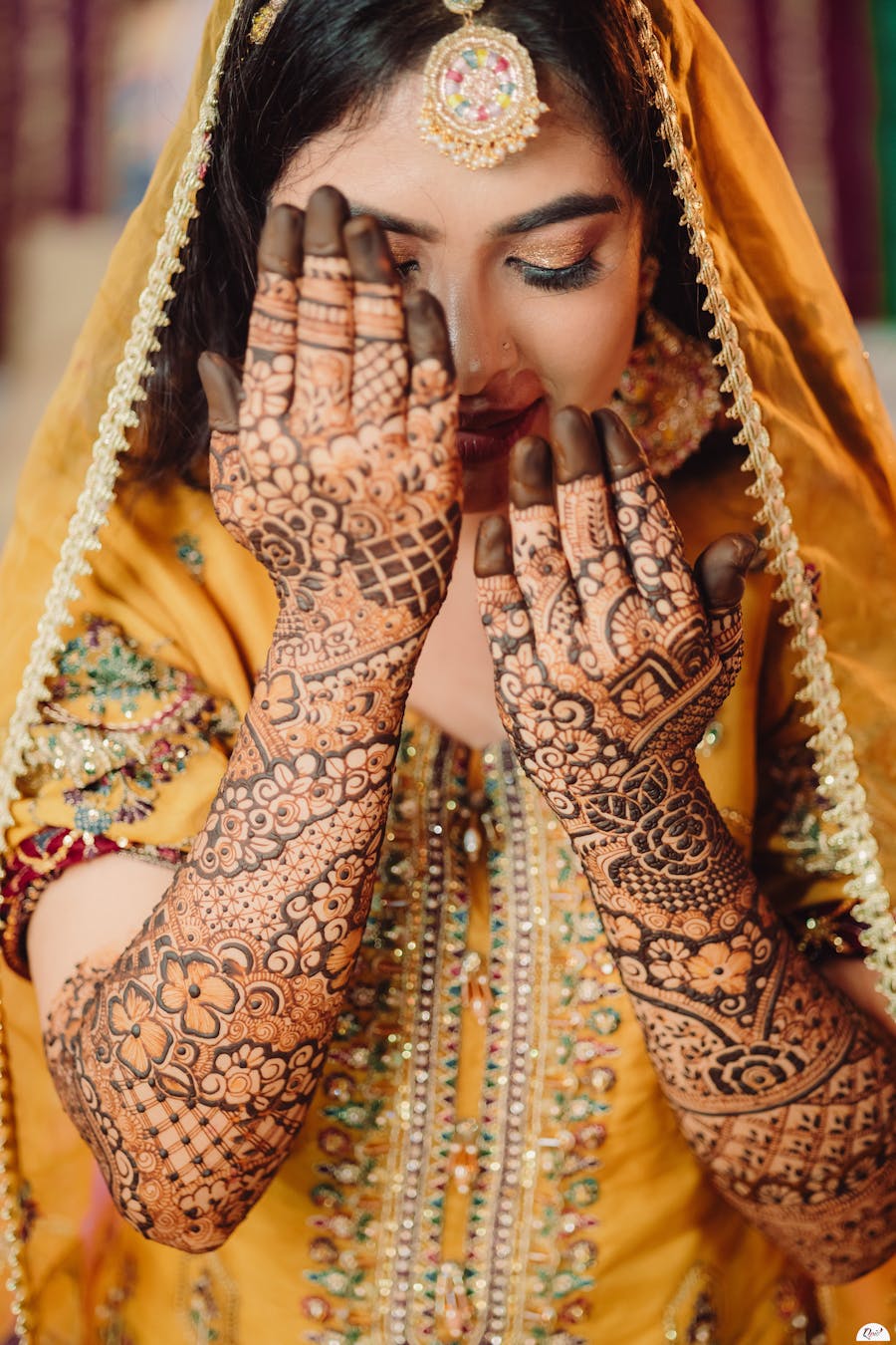 A eyes down pose of bride