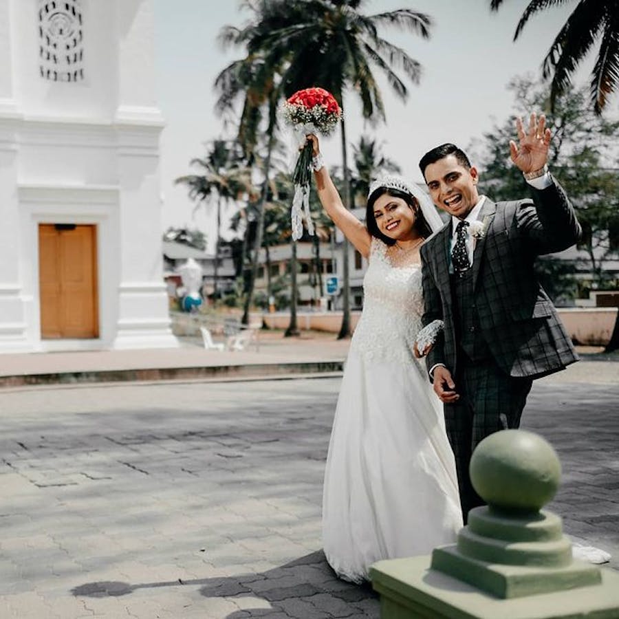 Christian couple waving