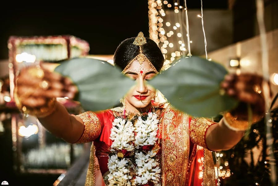 Elegant golden bengali mukut designs