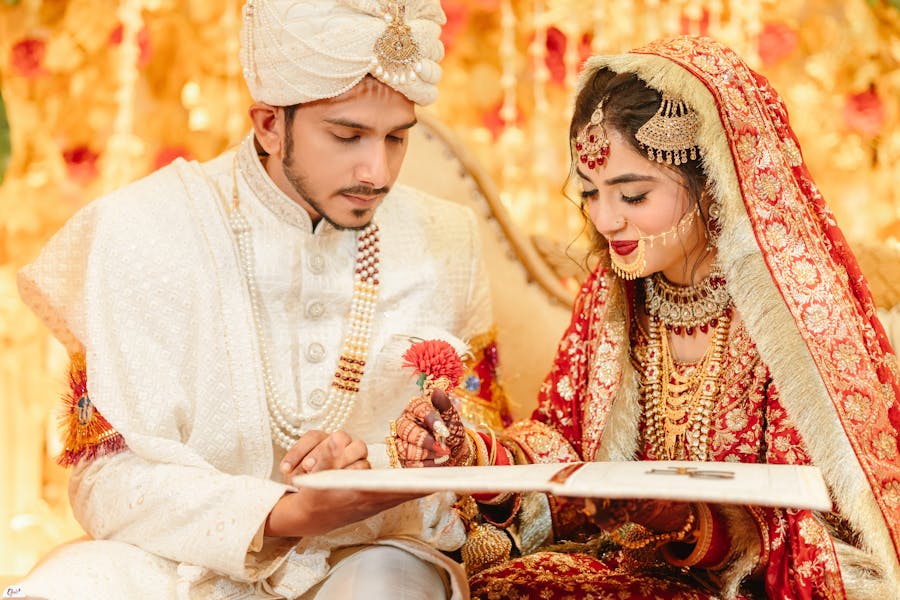 Couple signing registry paper pic