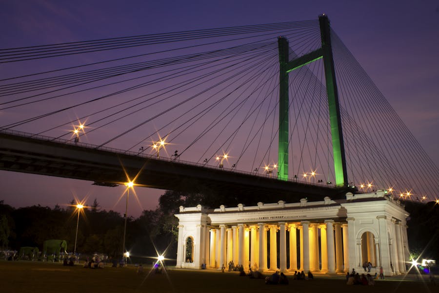 night view of the hooghly bridge and princep monument