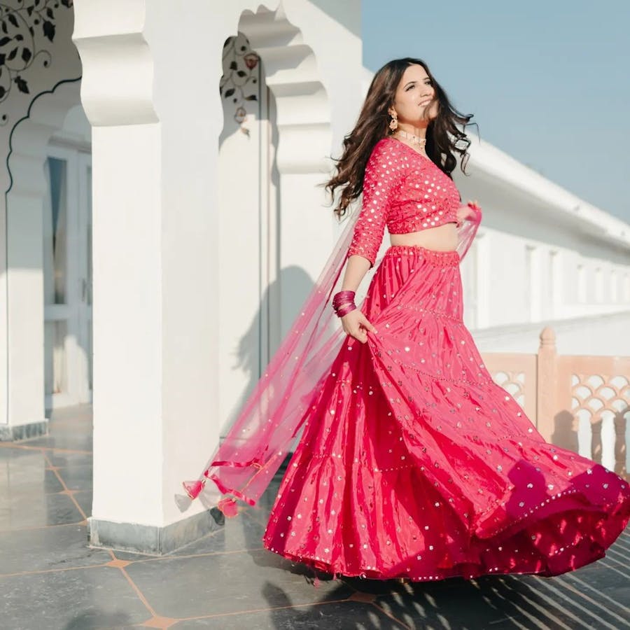 Bride in a solid pink lehenga