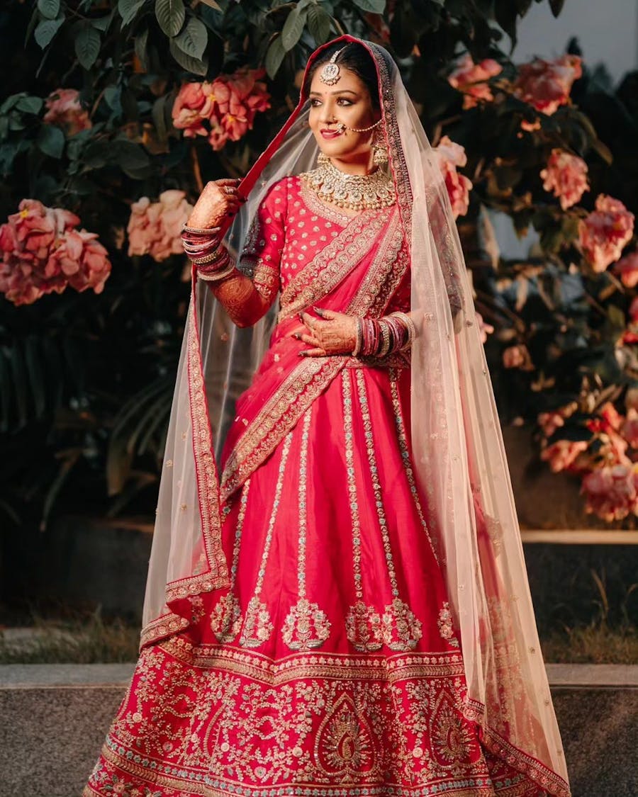 Bride in heavy lehenga