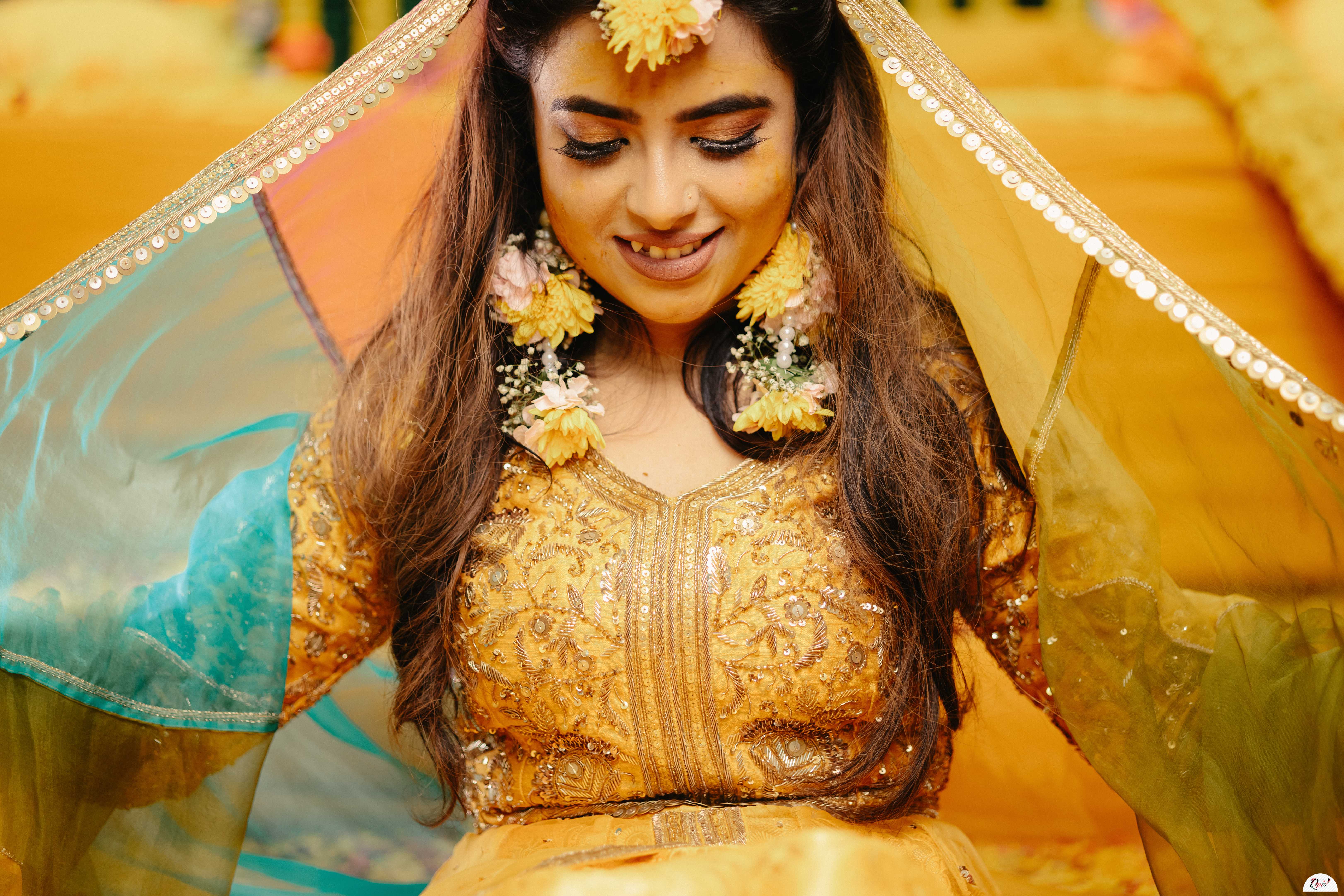 Photo of bride covered in veil