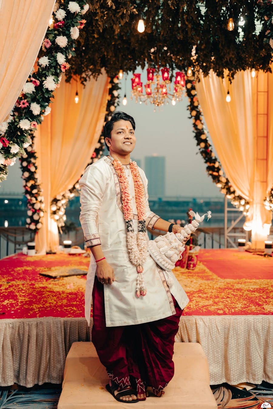 The contrasting charm of cream kurta and red dhoti