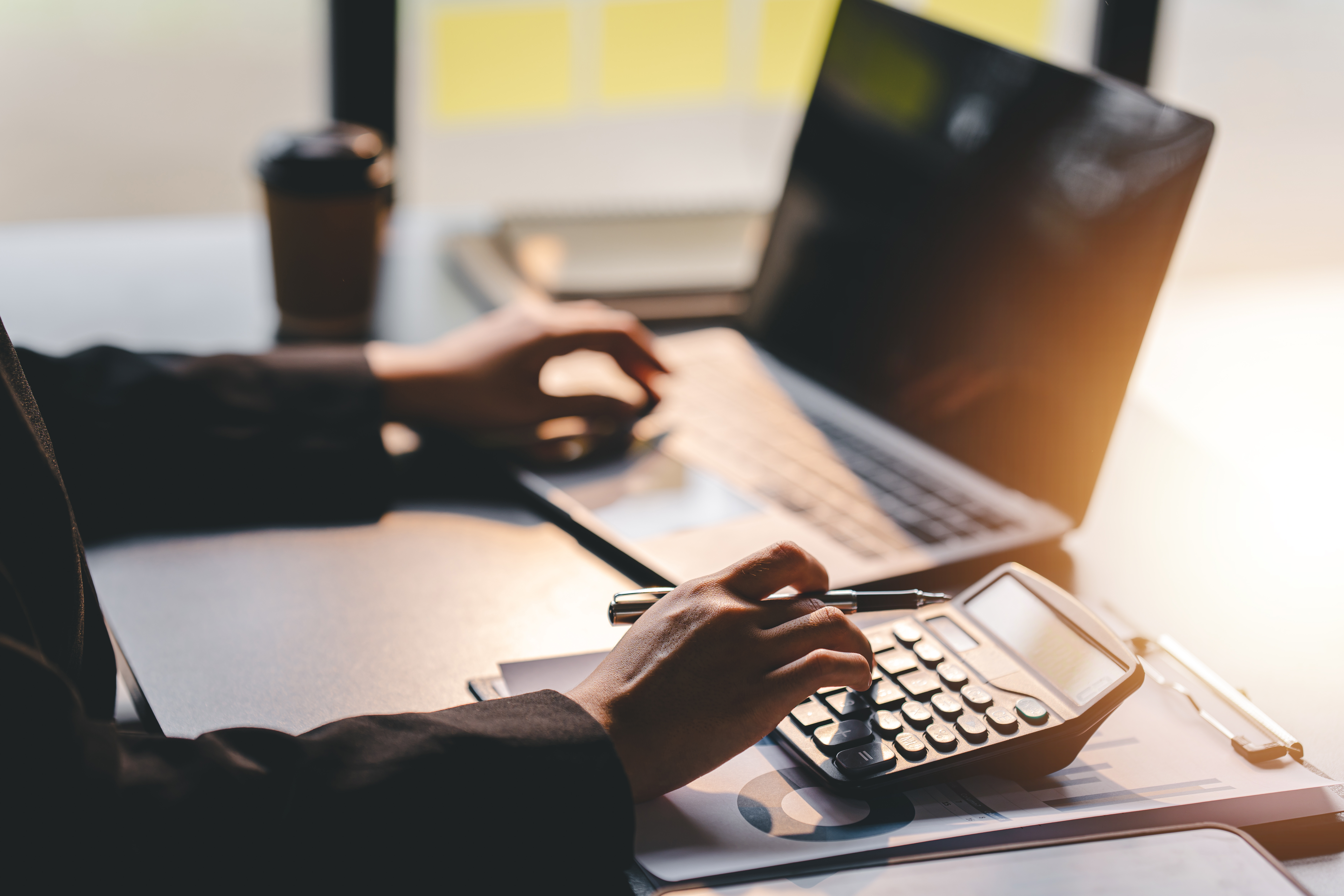 person calculates kiwisaver changes