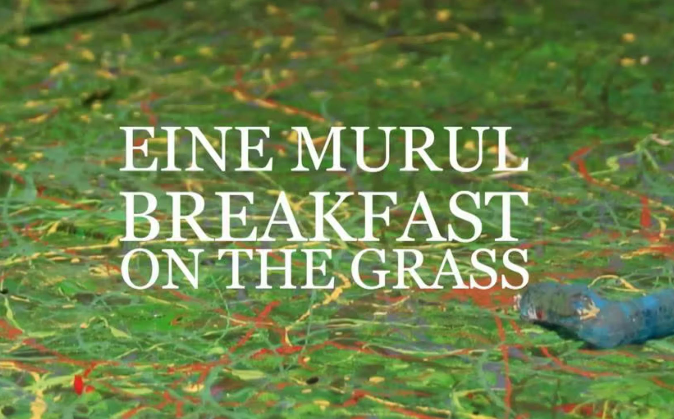 background of mixed paint splotch colours of green, red, blue and yellow. White text reads "EINE MURUL BREAKFAST ON THE GRASS"