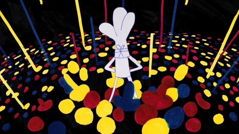 screenshot from Liisi Grünberg's Muki ja Kalju seiklus surnuaial (2017)
A black background with dots of yellow, blue and red look like splotches around a surface. In the middle stands a character in white, with tall hair and a tie around their head