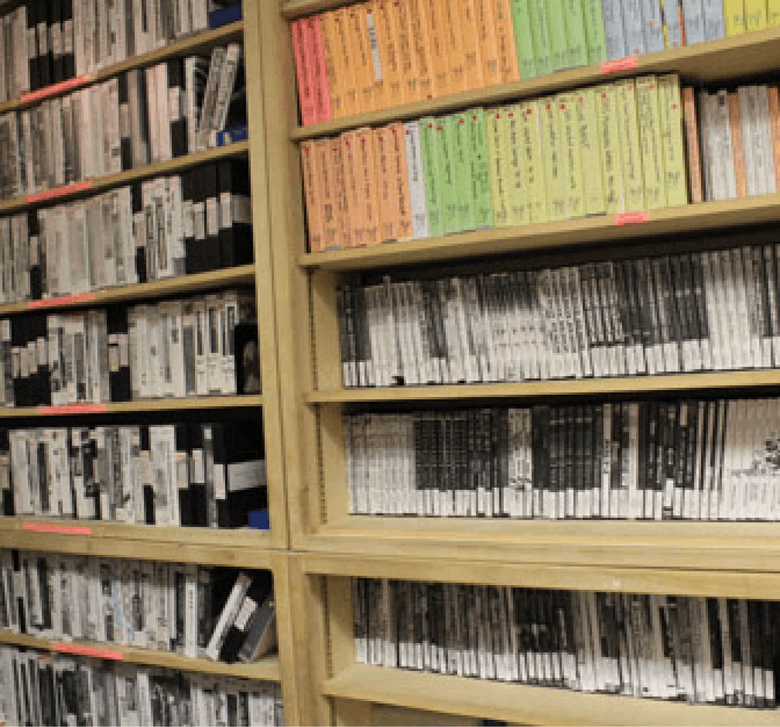 A photo of videos and DVDs on a large shelf