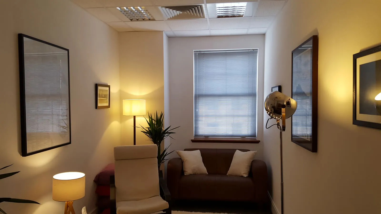 The Quiet Room therapy room: sofa, armchair and window