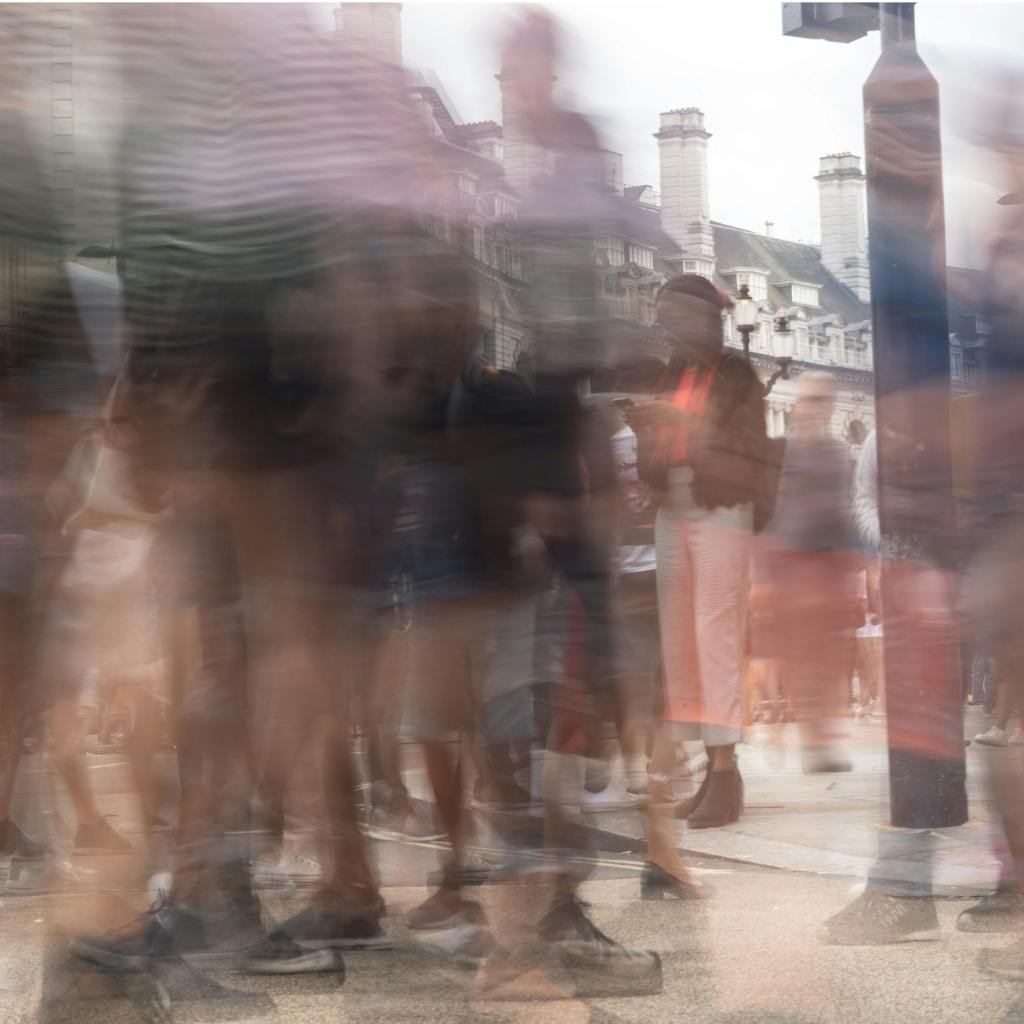 Pedestrians crossing road in London