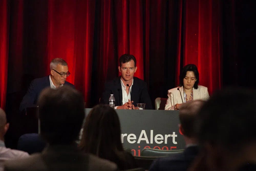 Paul Quinlan speaking on a panel