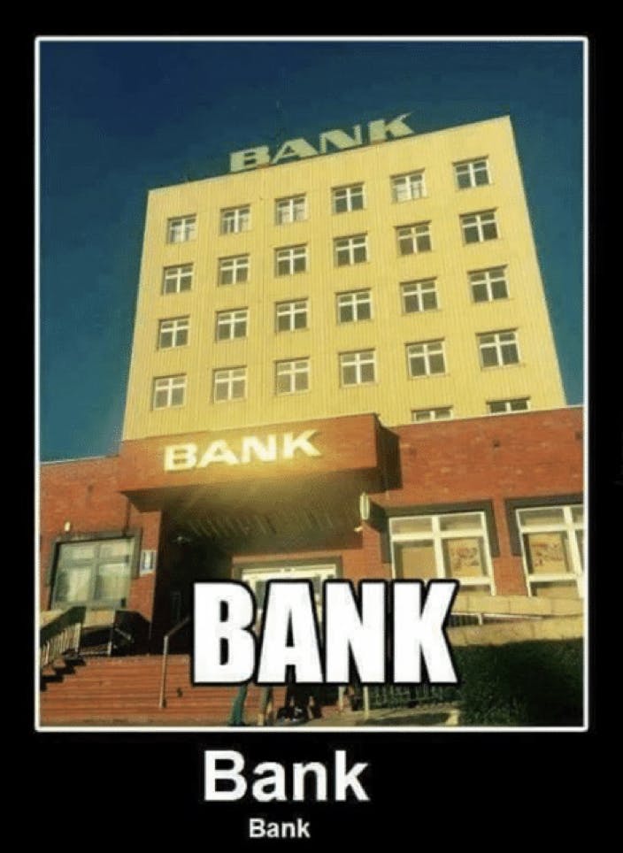 a building with a sign that says bank, blue sky, shiny letters and black background