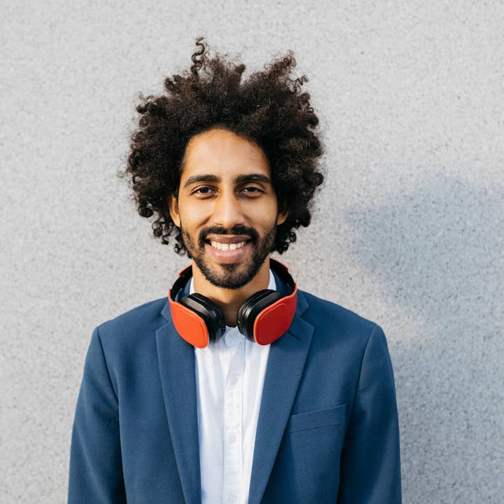 Man wearing headphones and smiling