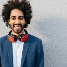 Smiling man wearing headphones