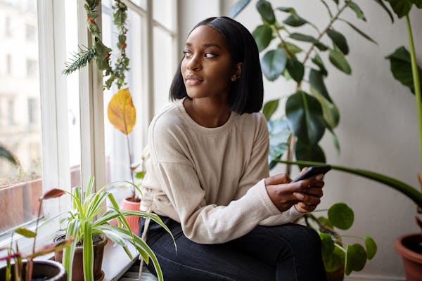 black woman on phone