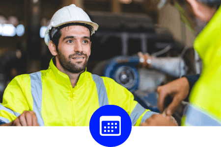 A man in a hard hat and high vis