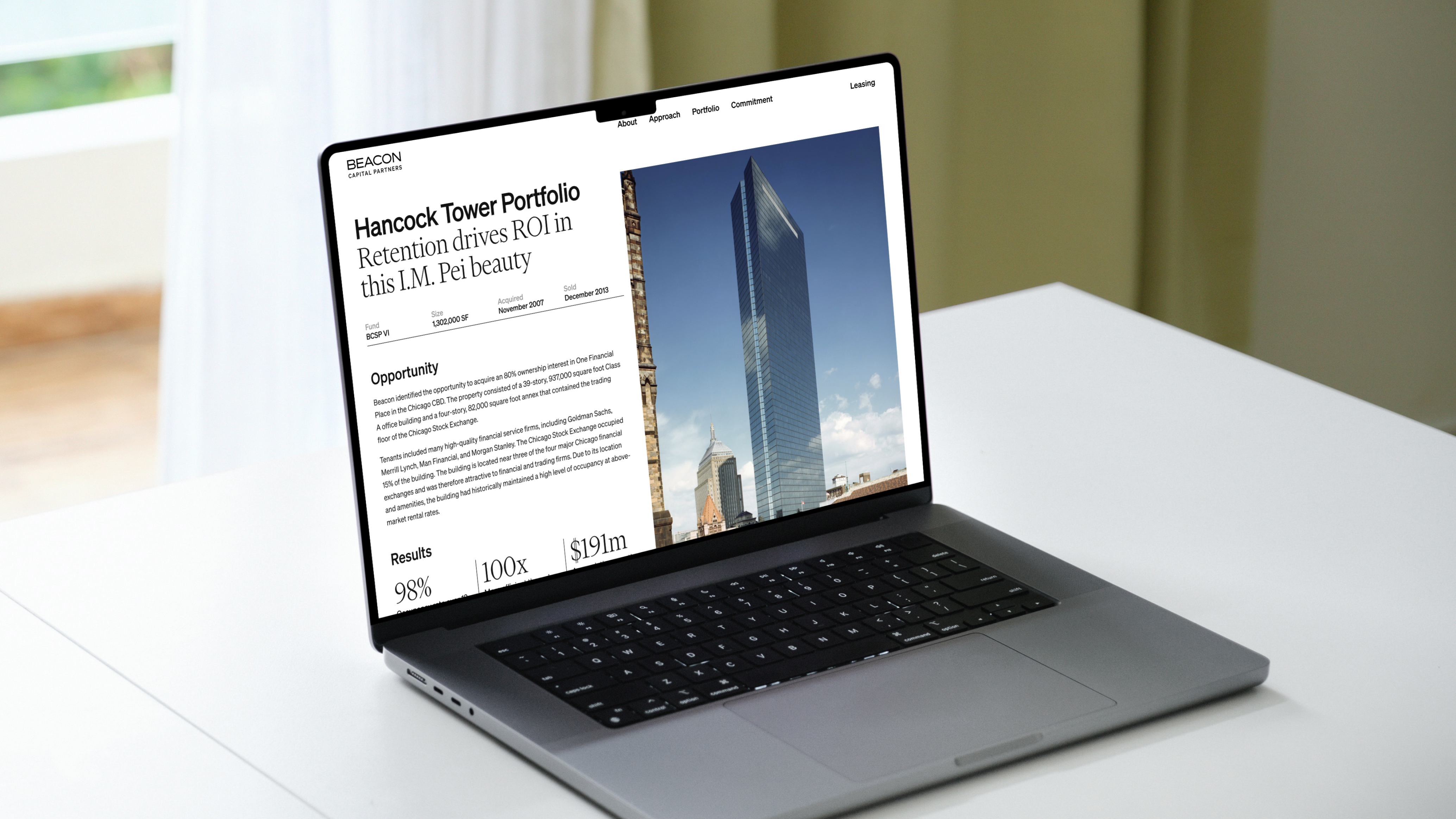 Website design for Beacon Capital featuring a laptop mockup showing a property page topper.