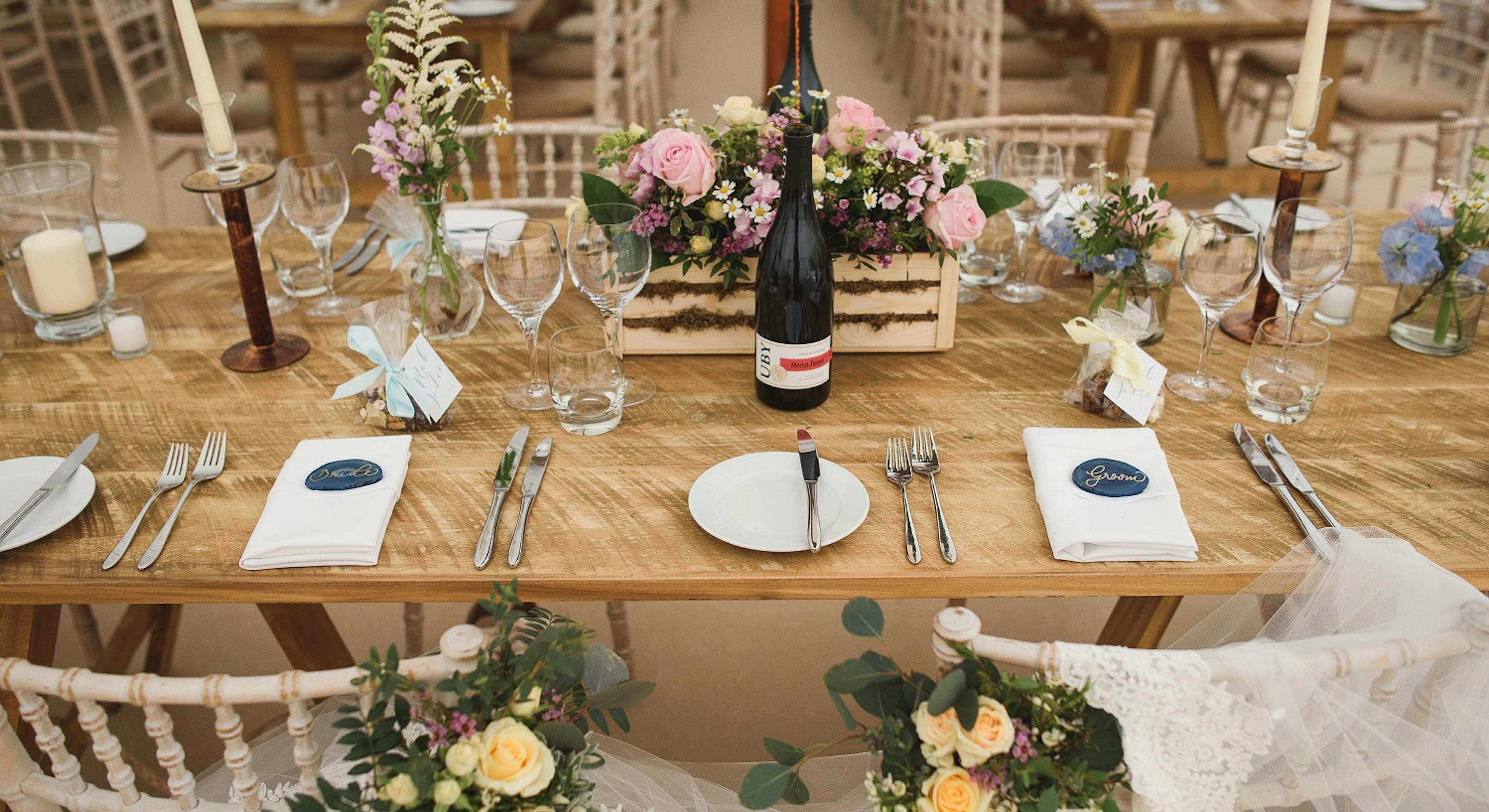 Rustic trestle table at wedding