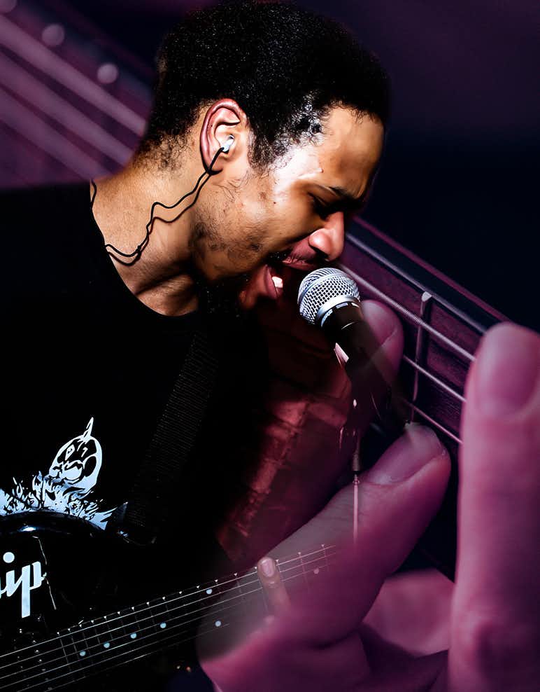 Man playing guitar and singing