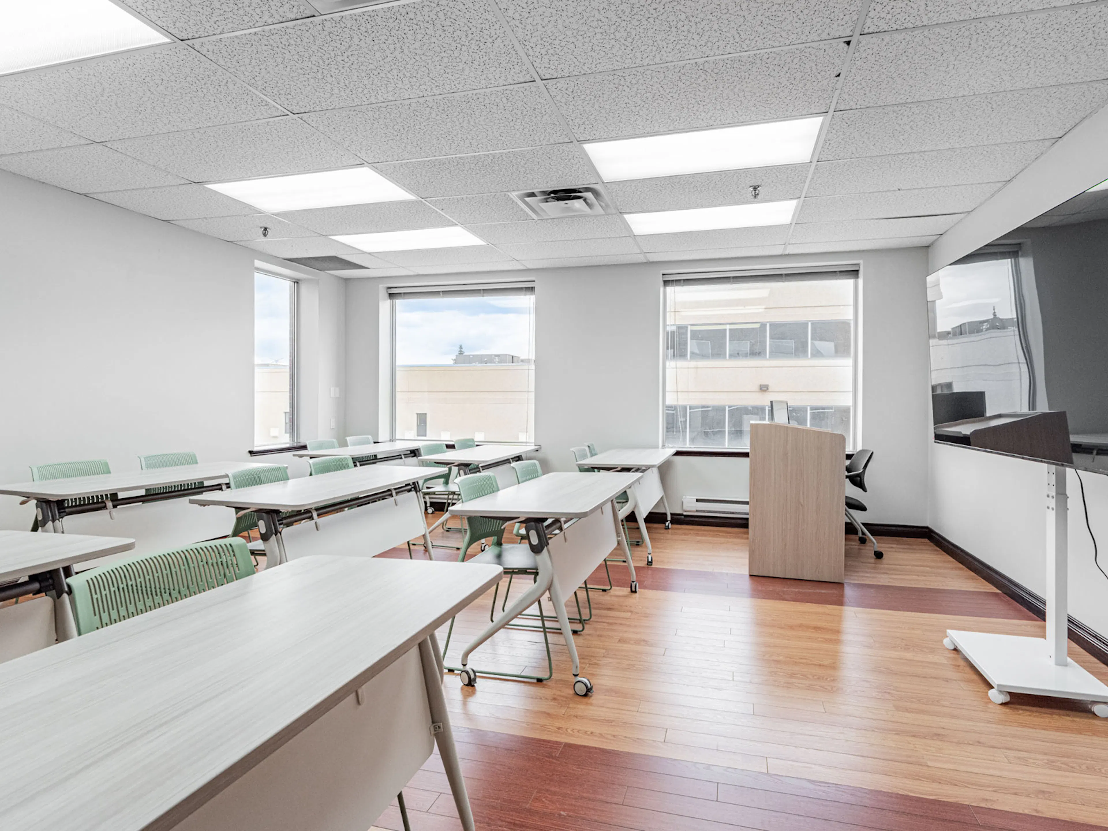 Classroom with desks, chairs, and multimedia