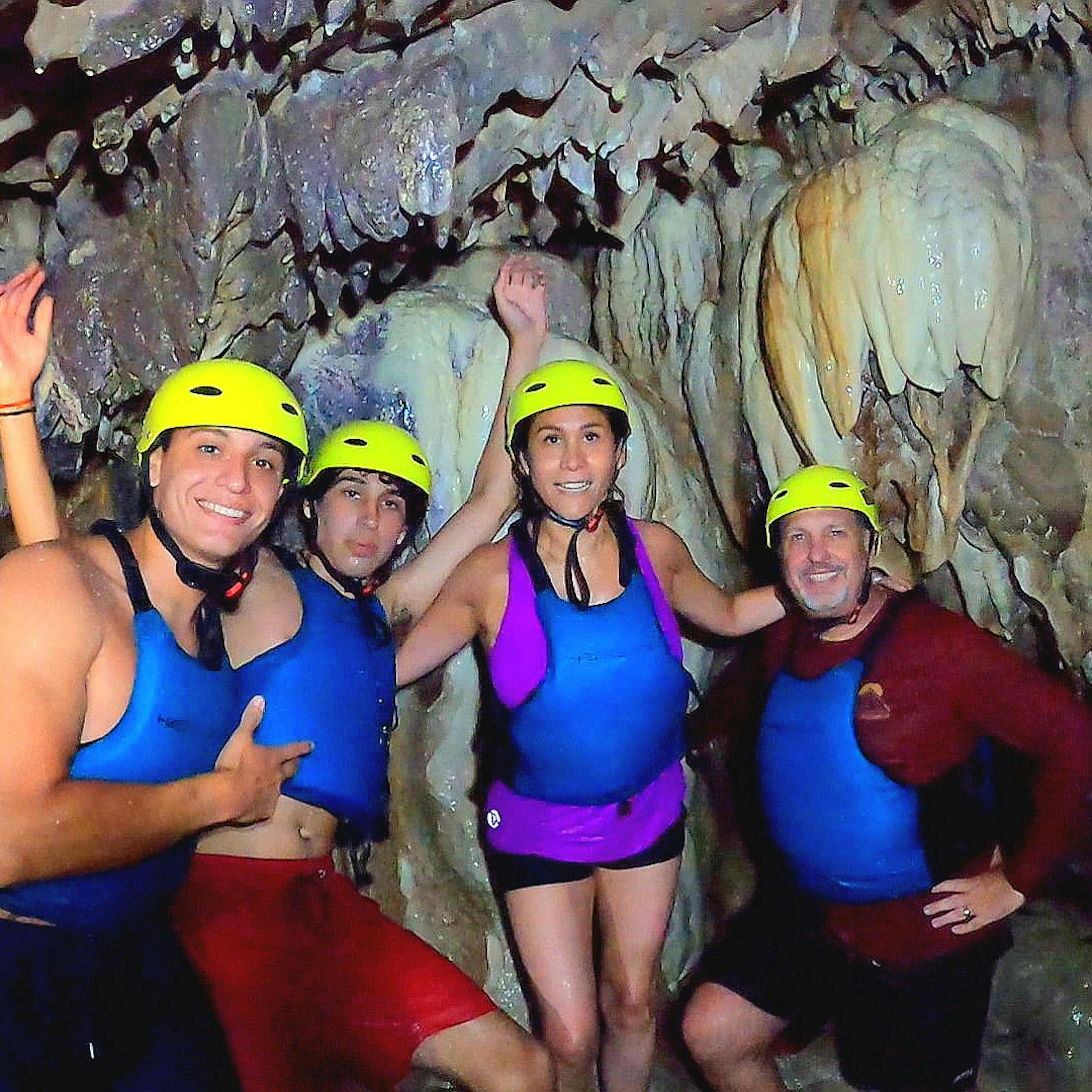 family in a cave on cetina river rafting trip