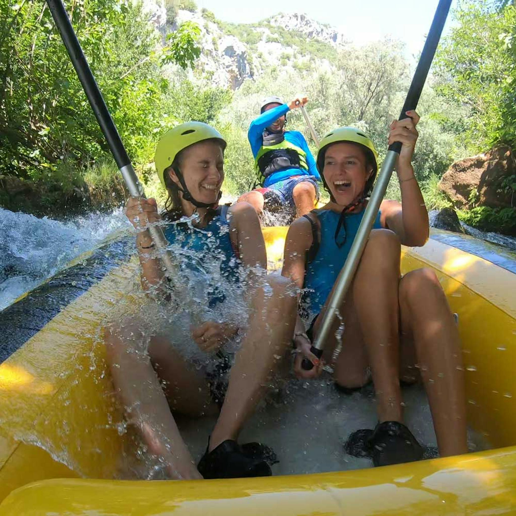 girls in a raft on cetina rafting trip