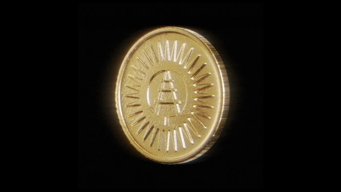 Gold animated coin with the Rail Park logo on a black background