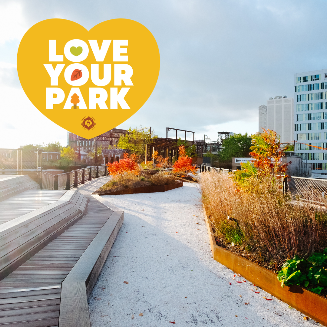 Love Your Park logo over a photo of an elevated park walkway.