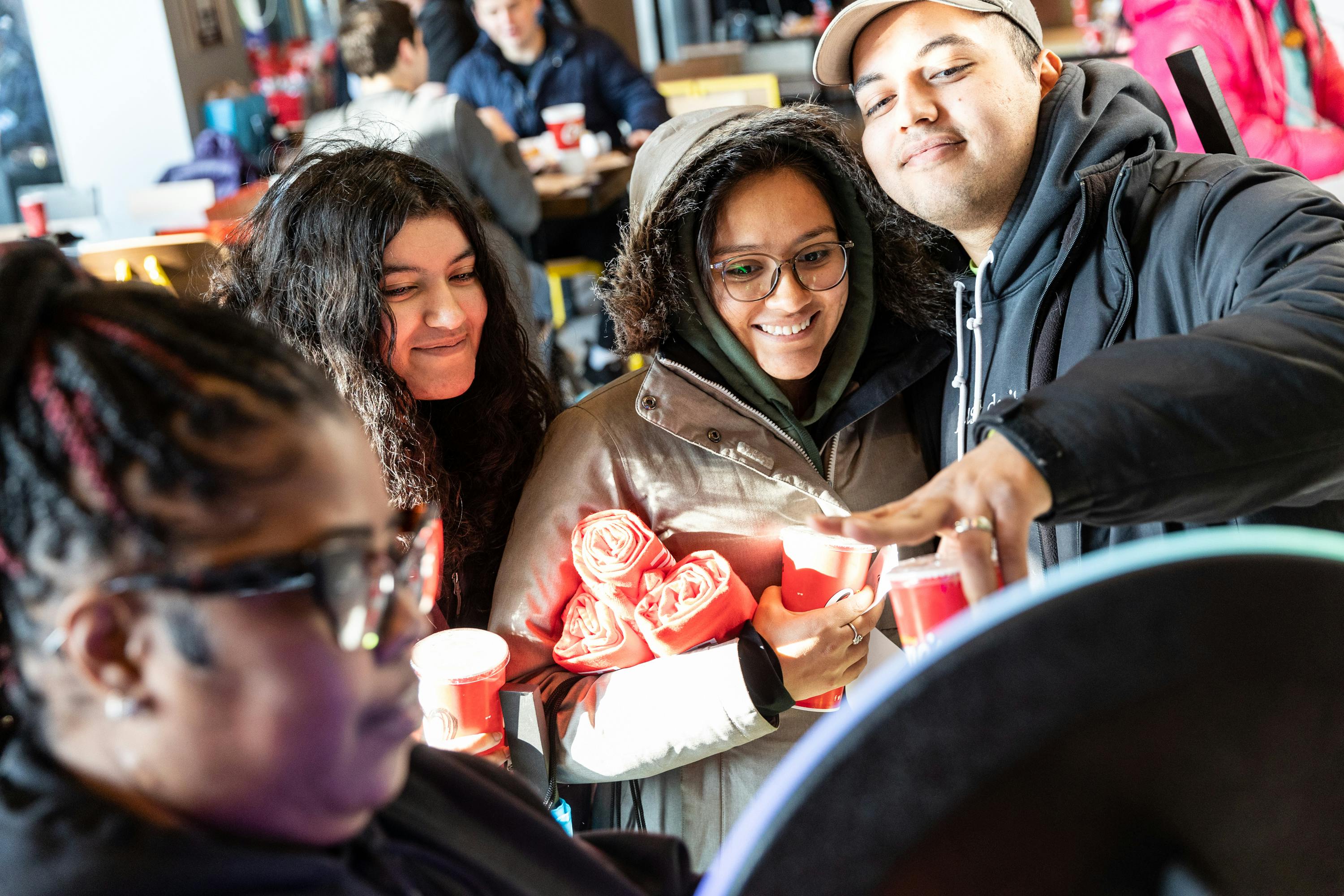 People enjoying the grand opening of Raising Cane's