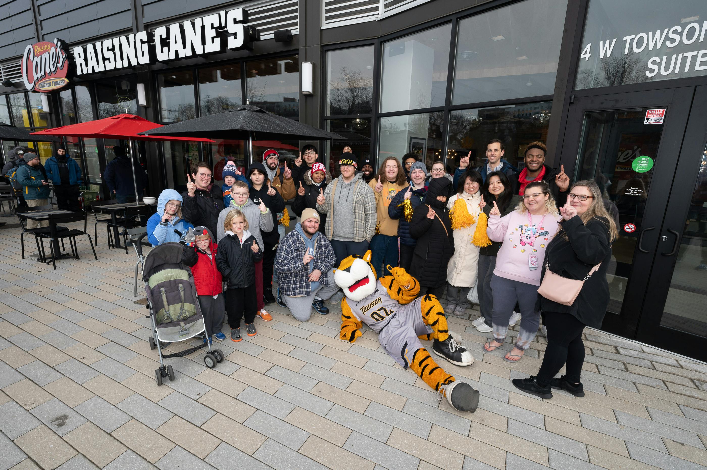 Doc the Tiger celebrating the offical opening of Raising Cane's