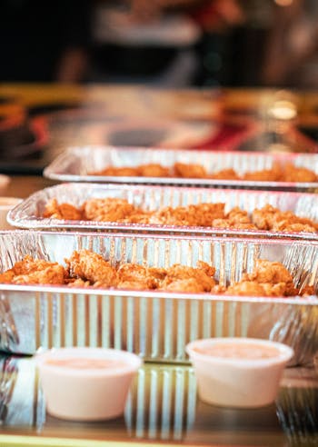 Trays of chicken fingers