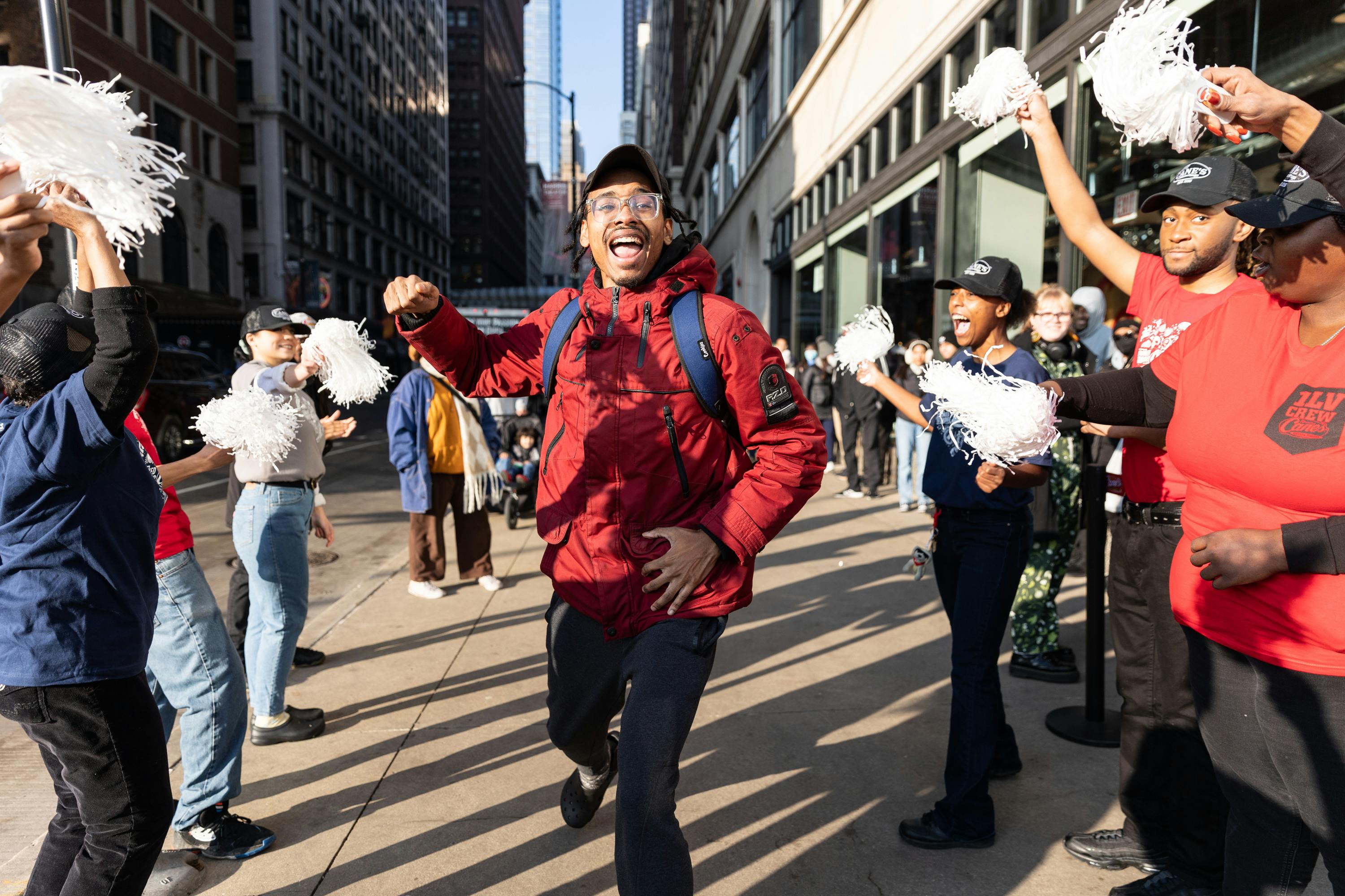 Fans excited for the grand opening of Raising Cane's in Chicago. 