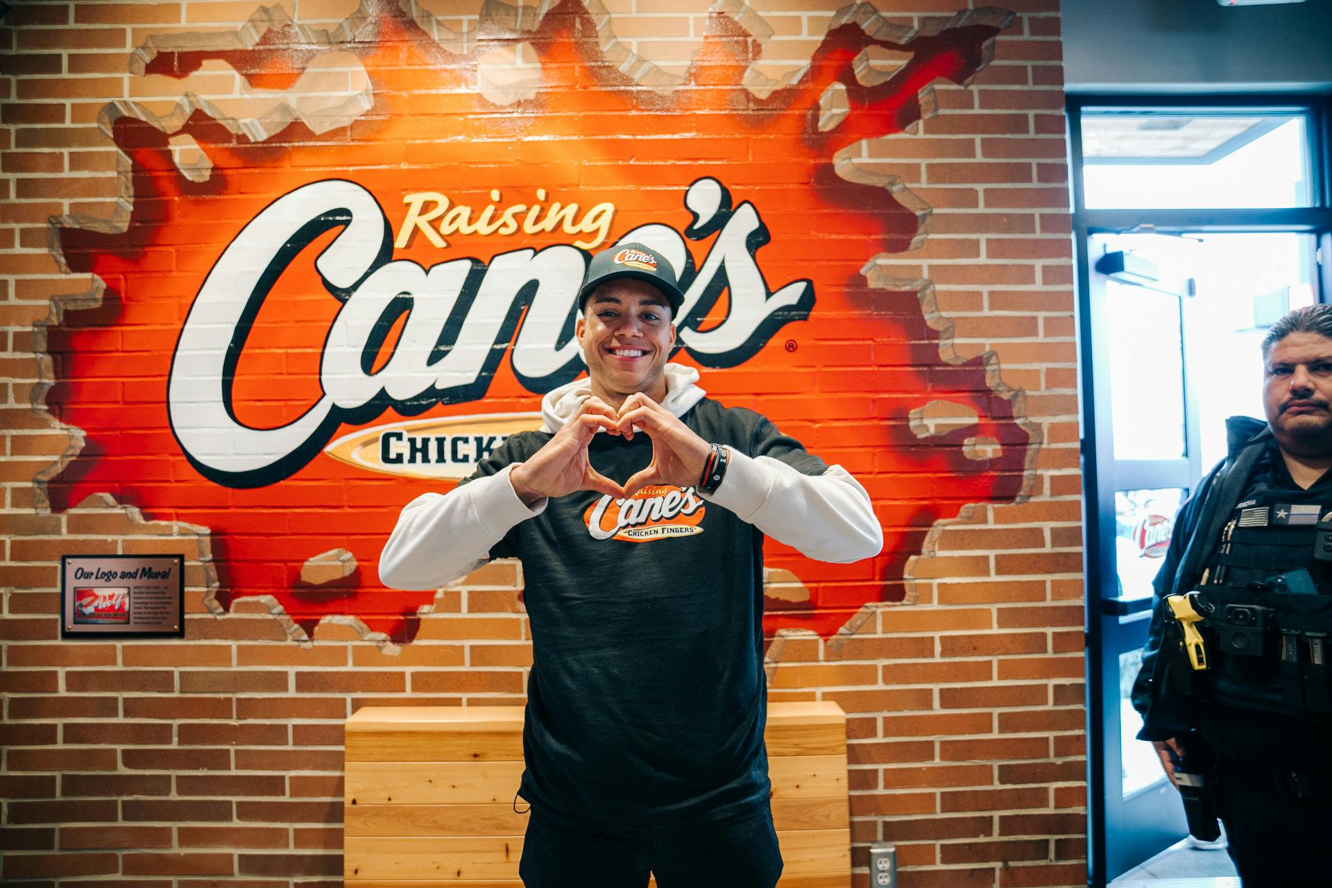 Jeremy Pena showing One Love at Raising Cane's 