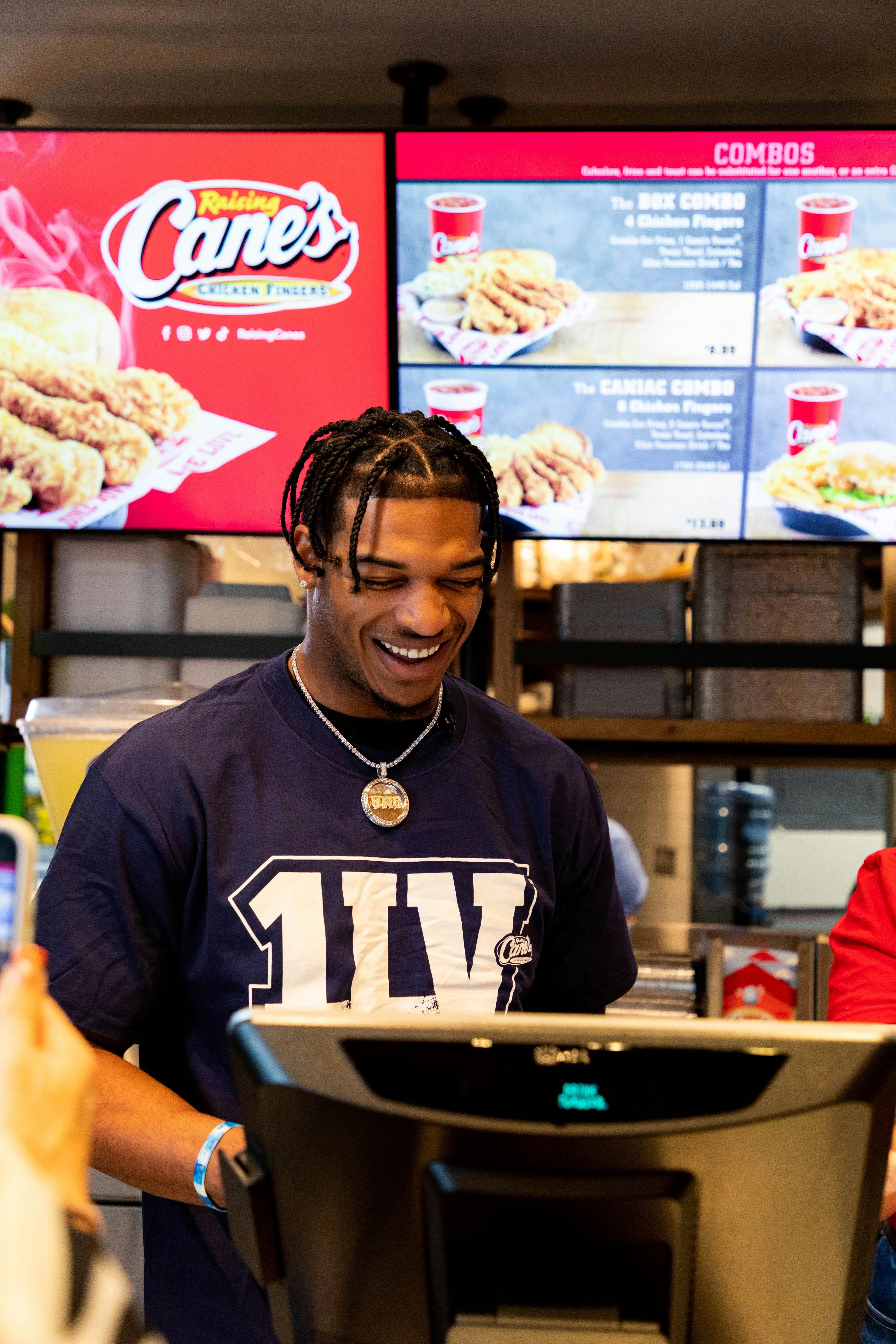 Ja'Marr Chase working at the drive-thru at Raising Cane's