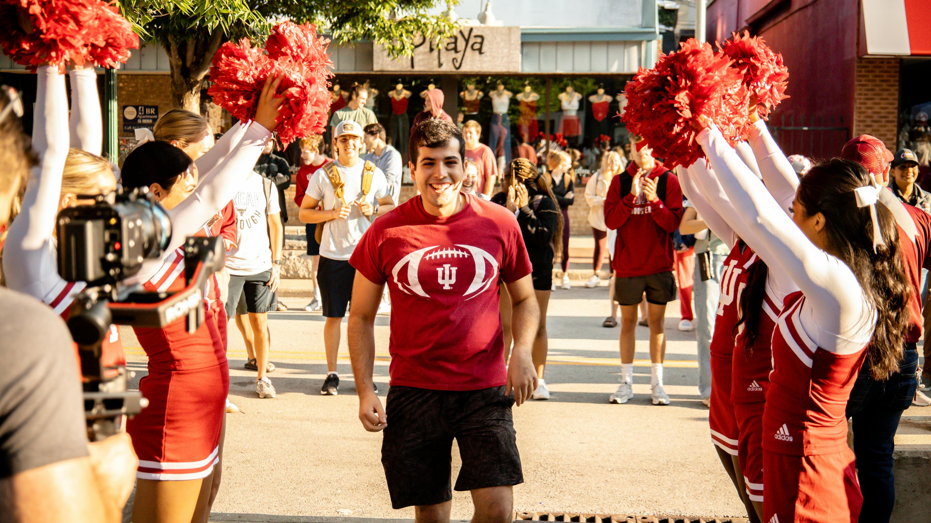 Indiana University Cheerleaders helping celebrate on grand opening day