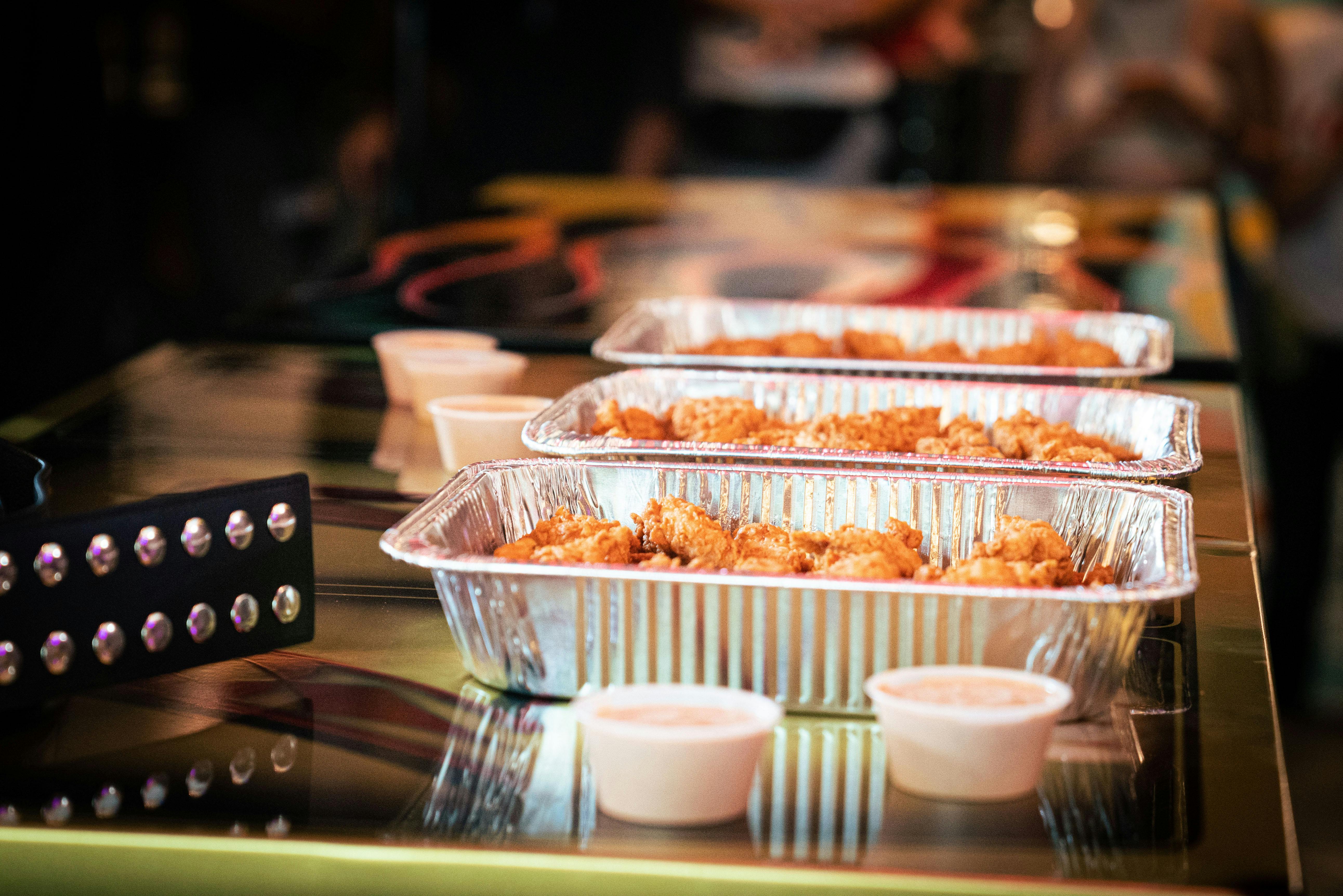 Trays of Raising Cane's Chicken Fingers