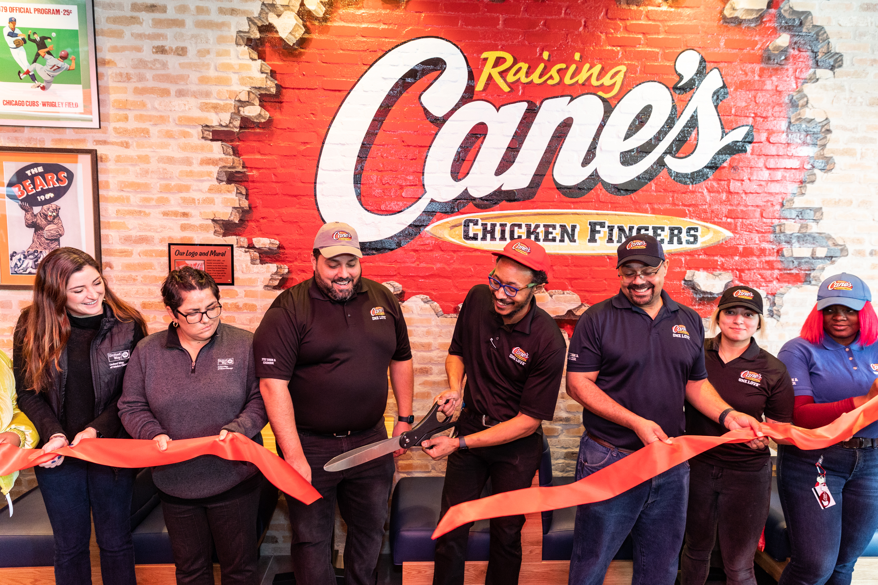 Hundreds Raising Cane’s Chicago Flagship Restaurant Raising