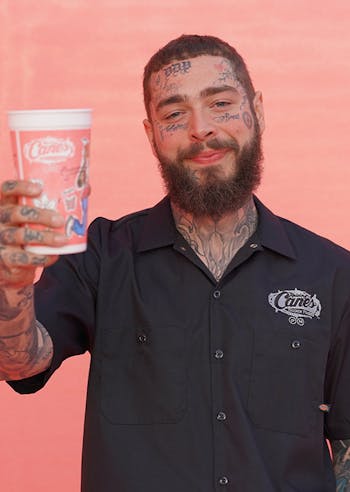 Post Malone holding a promo cup