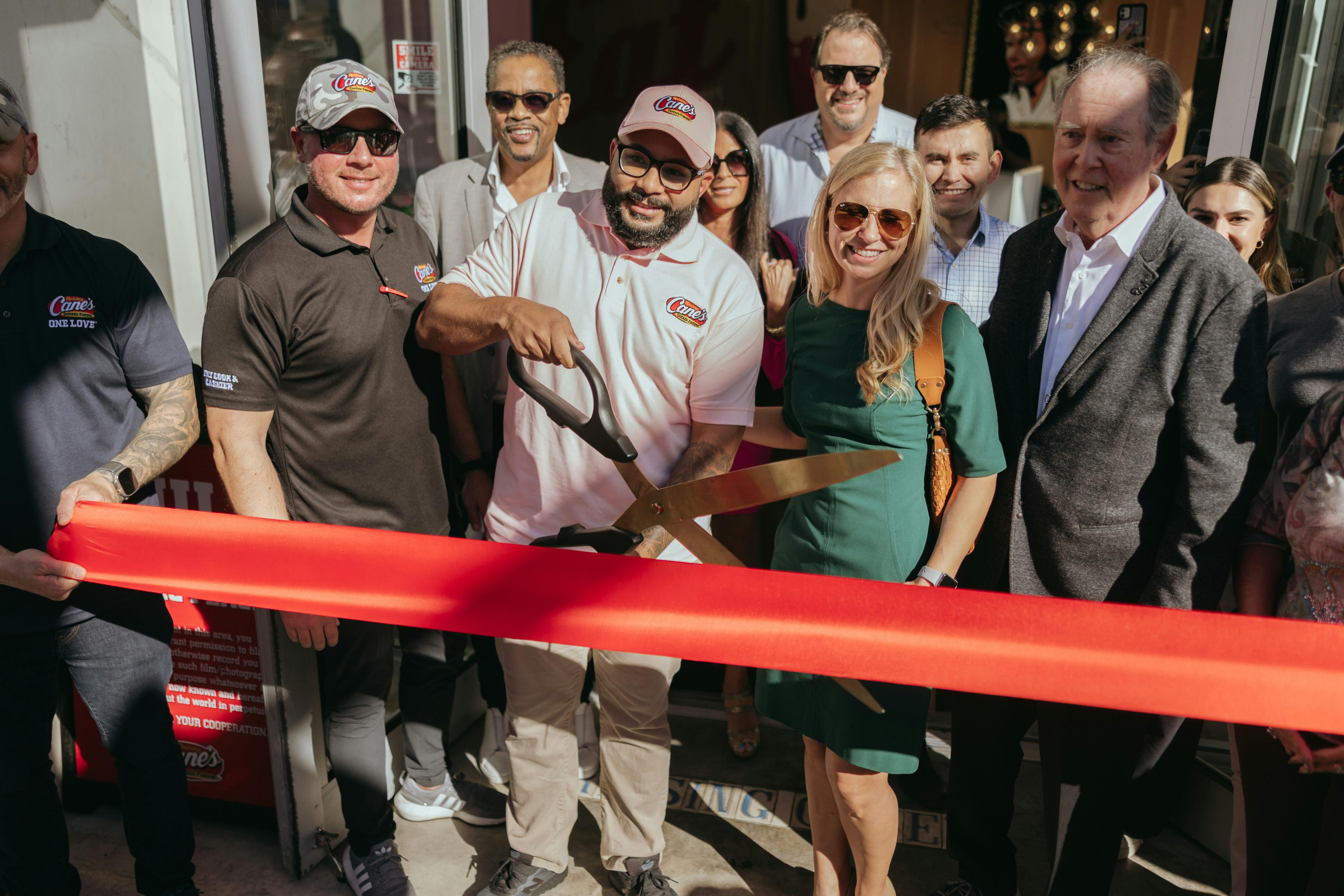 Ribbon cutting for Raising Cane's new Miami Beach location