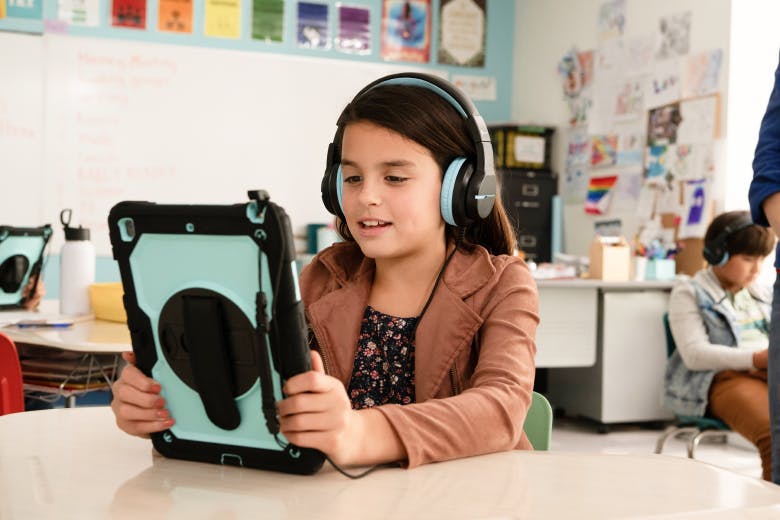 Student reading on an iPad
