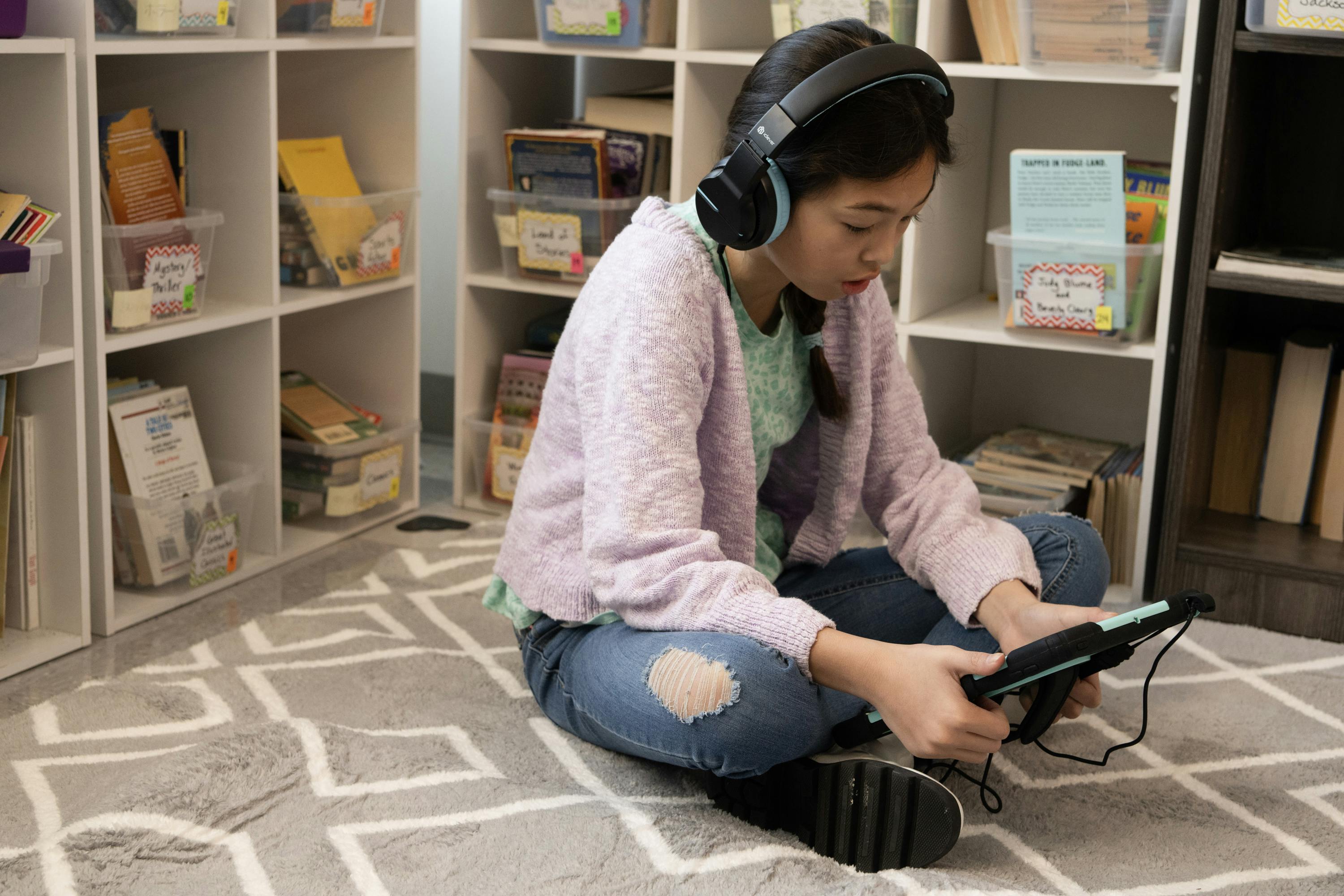 A student reading independently with Rally Reader
